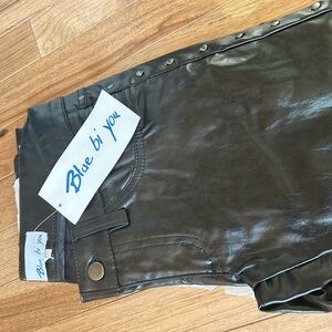 Faux  black leather pants with studded sides